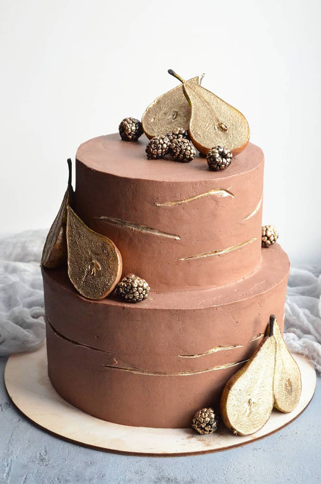 32 Jaw-Dropping Pretty Wedding Cake Ideas - Chocolate wedding cake adorned with gold pears and gold berries,Wedding cakes #weddingcake #cake #cakes #nakedweddingcake