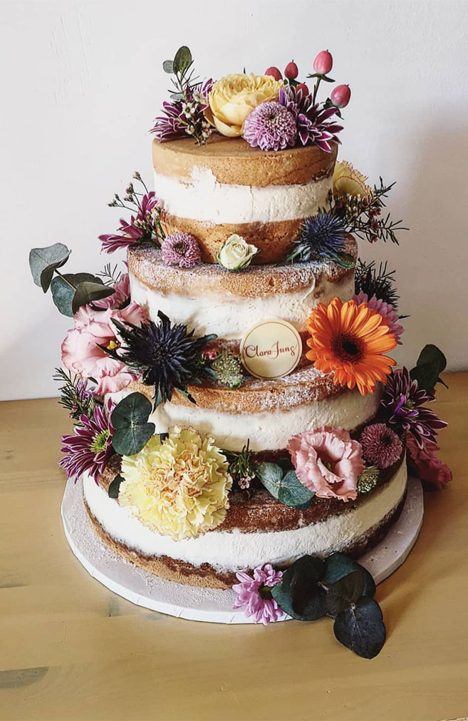 32 Jaw-Dropping Pretty Wedding Cake Ideas - Naked Wedding cake adorned with flowers #weddingcake #cake #seminakedweddingcake