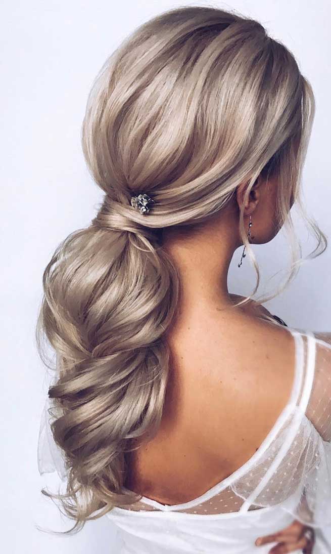 wavy and voluminous ponytail, ponytail hairstyles , wedding ponytail #ponytails wedding hairstyles , classic wedding hairstyles