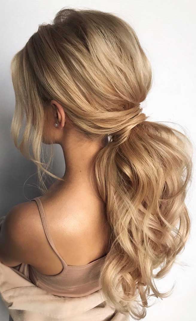 wavy and voluminous ponytail, ponytail hairstyles , wedding ponytail #ponytails wedding hairstyles , classic wedding hairstyles