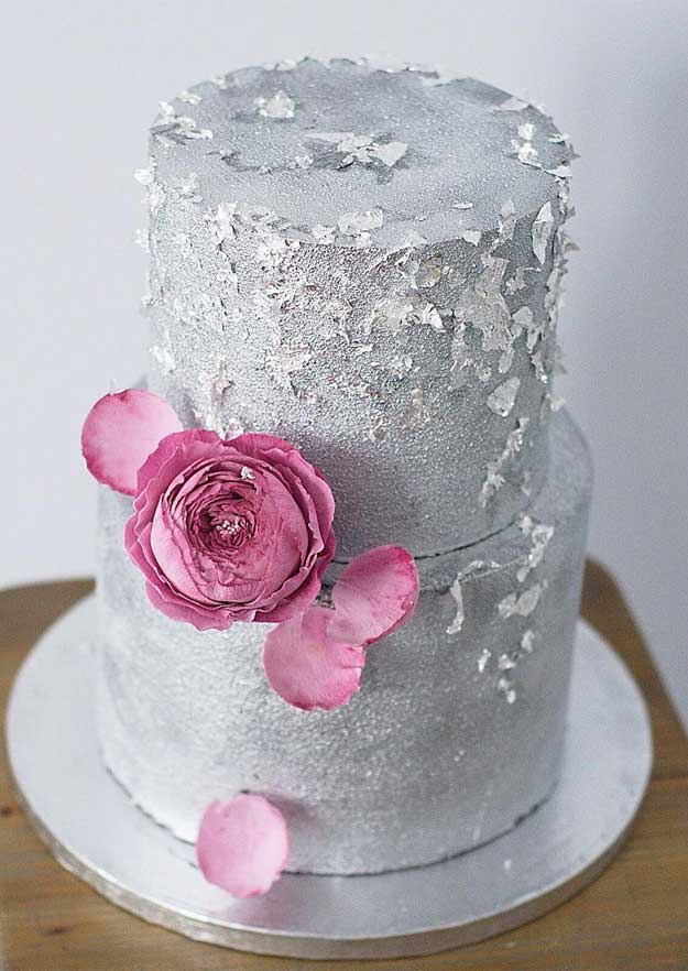 two tier grey wedding cake adorned with pink flowers, wedding cakes #weddingcakes #cakedesigns