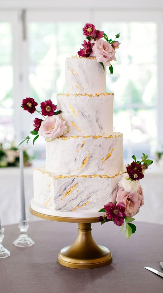 four tier regal buttercream marble and gold wedding cake, unique wedding cake, pretty wedding cakes #weddingcakes #cakedesigns wedding cakes