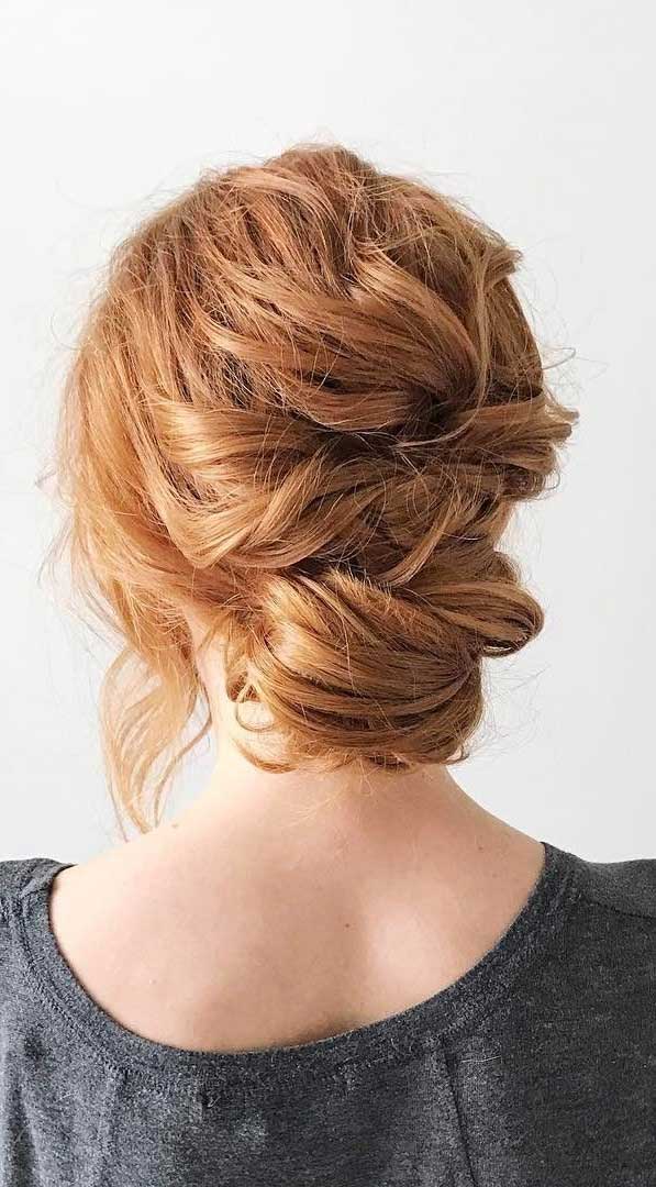 Pretty textured messy updo wedding hairstyle
