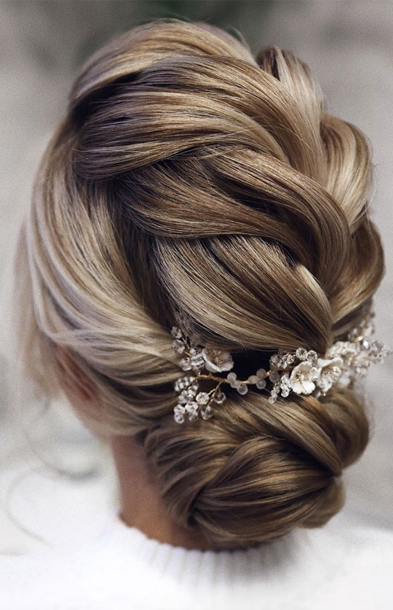 Chic Updo Hairstyles for Modern Classic Looks - Braided Low bun