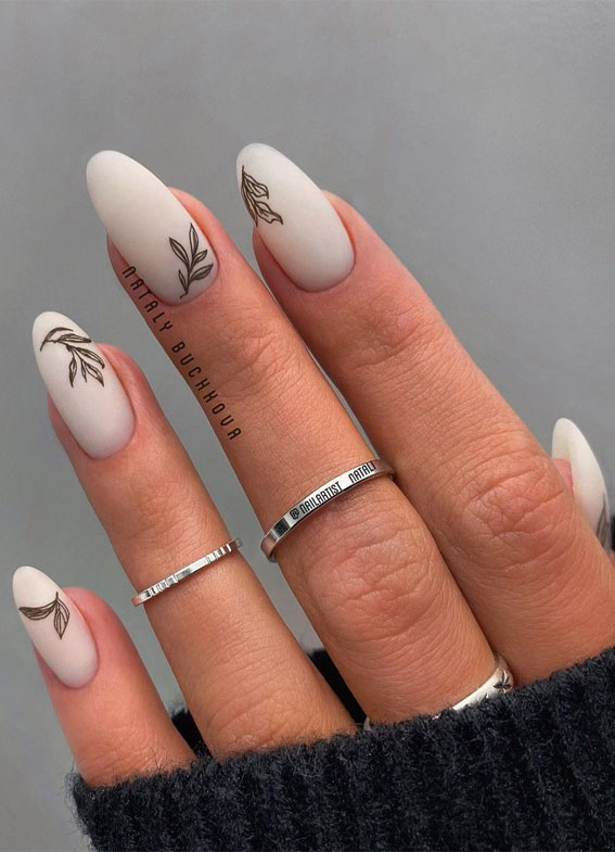 Creative & Pretty Nail Trends 2021 : Black leaf on milky nails