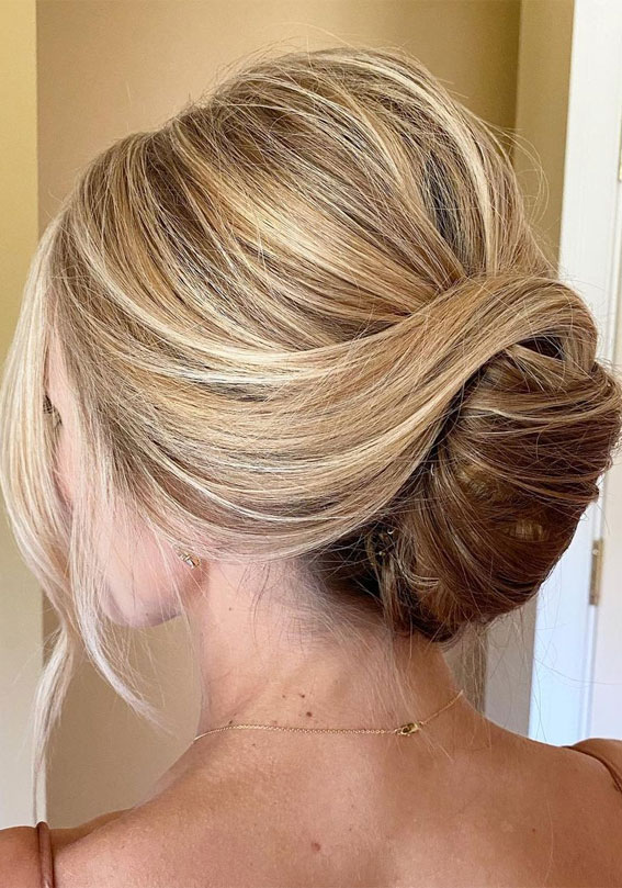 This elegant chignon french twist updo wedding hairstyle perfect for any  wedding venue