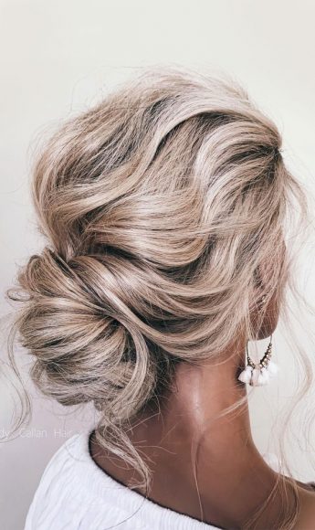 54 Cute Updo Hairstyles That Are Trendy for 2021 : Textured messy boho bun