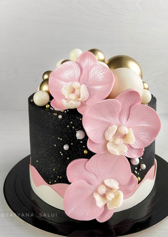 black and pink birthday cake, pink orchids on black cake, cake decorating ideas, cake ideas 2021, birthday cakes 2021