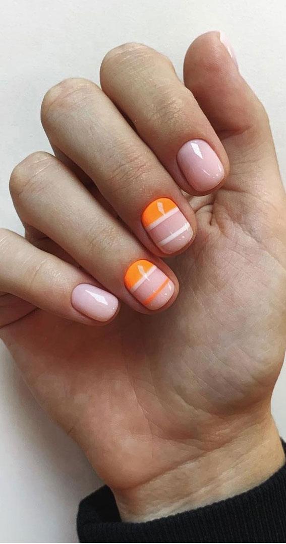 Cute Spring Nails That Will Never Go Out Of Style : Pink and orange stripped nails