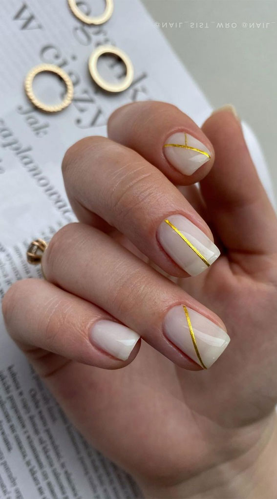 minimalist nails, nail art designs, nail design ideas, nude and gold nails