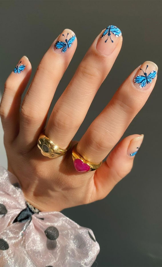 natural nails with butterfly, hand painted blue butterfly nails , spring nails , hand paint butterfly nail art, painted butterfly nail art designs, short nails 2021, short nail art designs, hand painted short nails