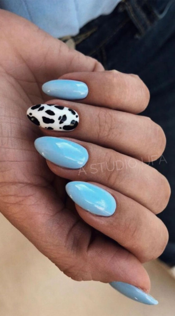 cow print nails, mix and match nail designs, baby blue nails, baby blue and animal print nails, blue and cow print nails