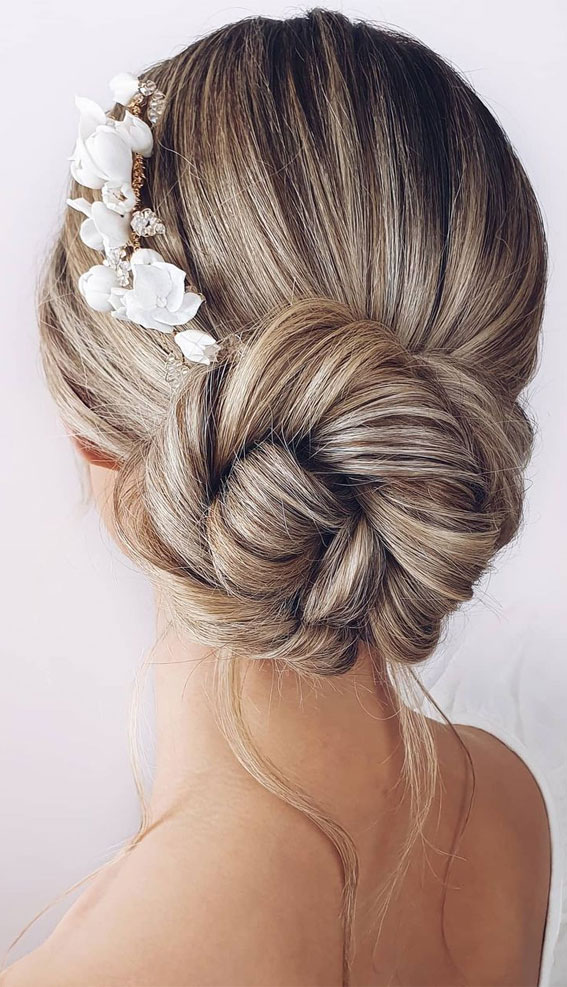 70 Latest Updo Hairstyles for Your Trendy Looks in 2021 : Bridal Bun with White Accessories