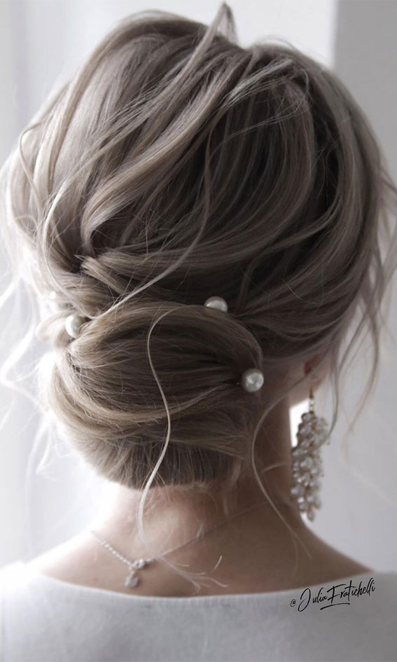 70 Latest Updo Hairstyles for Your Trendy Looks in 2021 : Elegant bridal updo with subtle messy