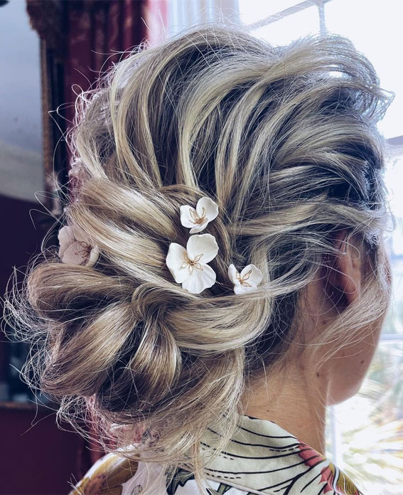 70 Latest Updo Hairstyles for Your Trendy Looks in 2021 : Trendy low bun with soft twists
