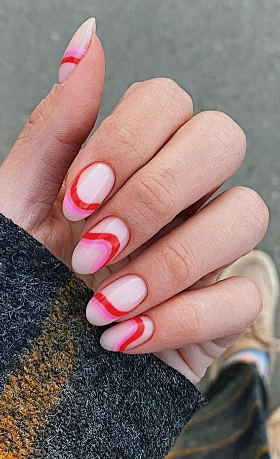 abstract oval nails, pictures of oval shaped nails, oval nail ideas, abstract nail art designs, oval nail designs 2021, pink abstract nails, wave abstract nails, wave tip nails, rainbow tip nails