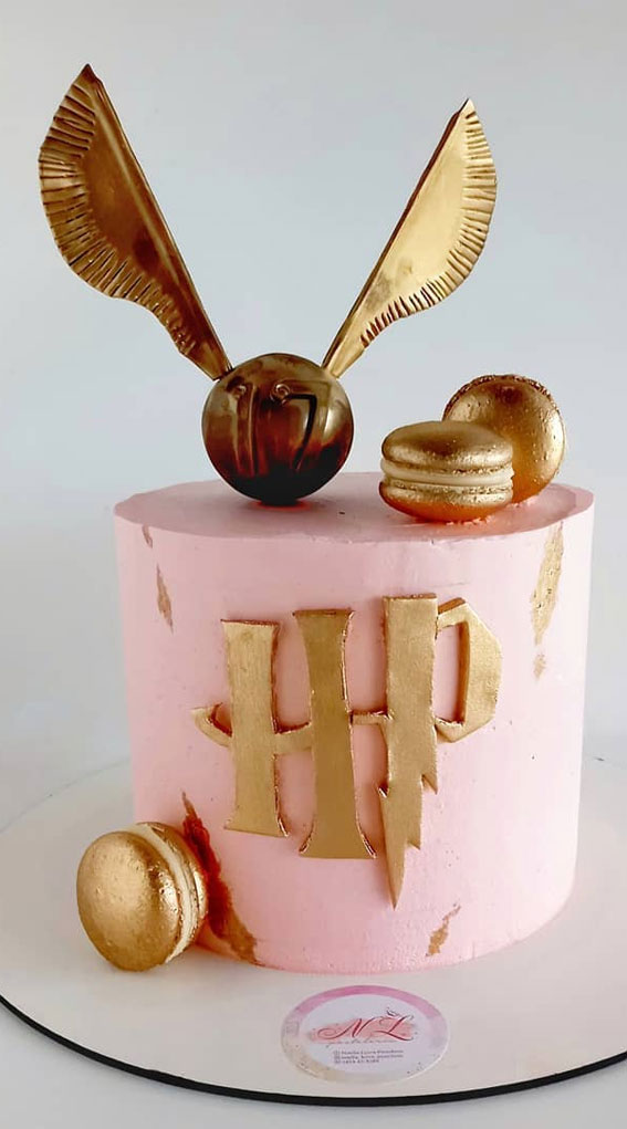 Harry Potter Cake Design Ideas : The Golden Snitch topped on pink cake