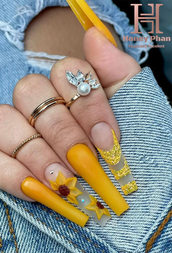 sunflower nail art, sunflower acrylic nails, acrylic coffin nails, mix and match fall nails, acrylic nails, nail polish colors, autumn nails 2021, fall nail polish colors 2021, nail color trends 2021, popular nail colors 2021,  2021 nail colors by month, trending nail colors 2021