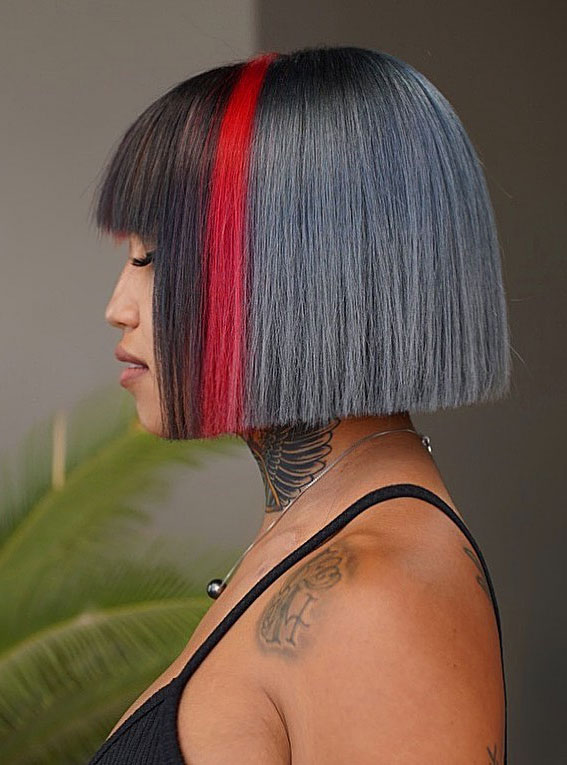 two tone hair color black and red, split color bob haircut, split dye hair black and red, bob haircut with two tone hair color, black and red hair color, hair color trends 2021