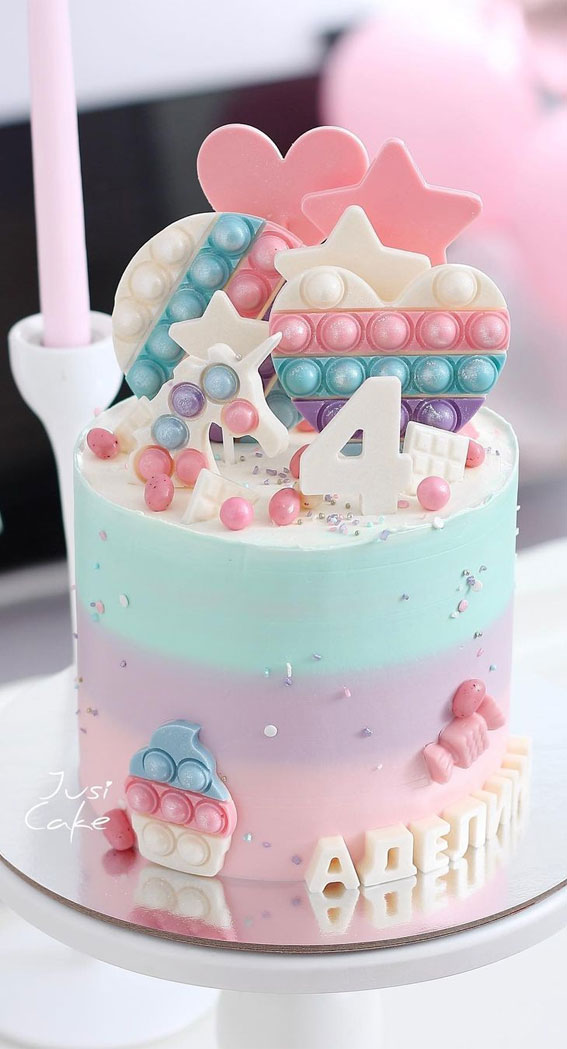 4th birthday cake, blue and pink birthday cake, fidget toy 4th birthday cake, birthday cake for 4th birthday