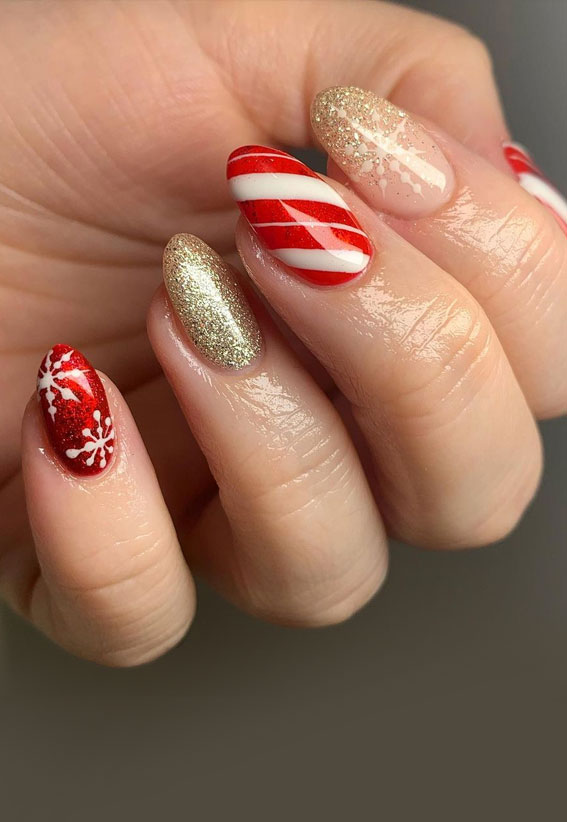 The 39 Prettiest Christmas & Holiday Nails : Candy Cane Red and Glitter Festive Nails
