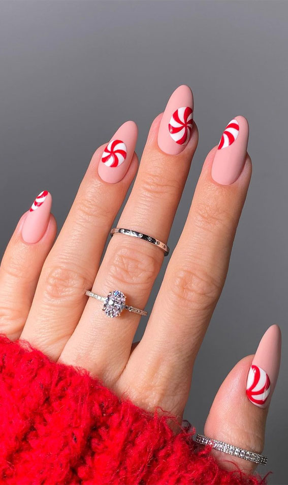 red peppermint candy christmas nails, red christmas nails 2021, christmas nail designs 2021, holiday nails 2021, festive christmas nails, festive nails 2021, christmas nails acrylic