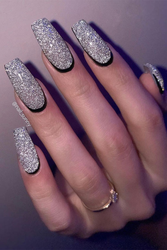 black reverse french tip with glitter nails, glitter holiday nails, glitter nail designs, glitter french tip nails, glitter french nails
