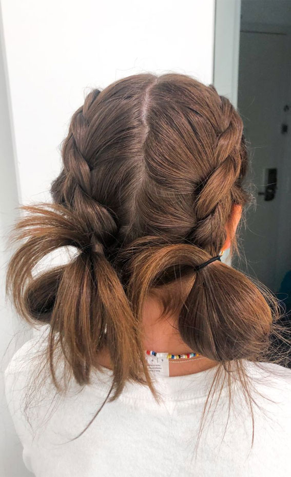 Image of Messy bun hairstyle for school girl