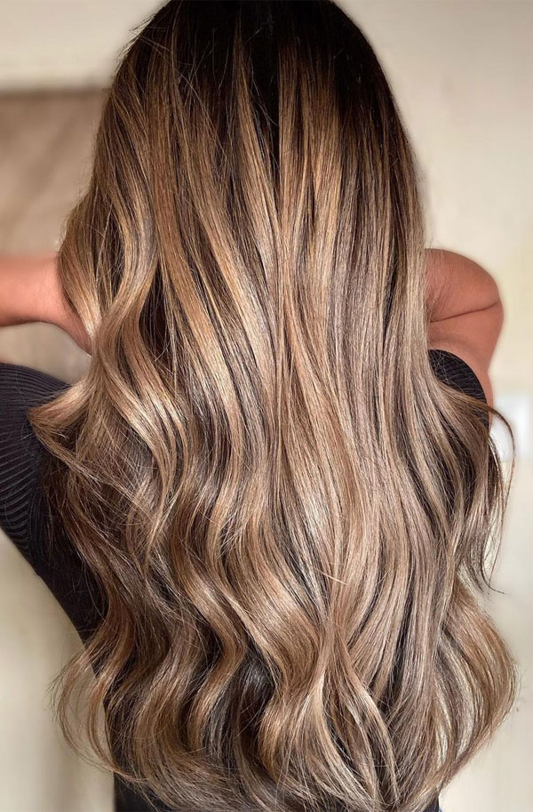 beautiful golden brown hair, layered hair cut with curtain bangs, hair color trends 2022, brunette hair color ideas, golden brown highlights