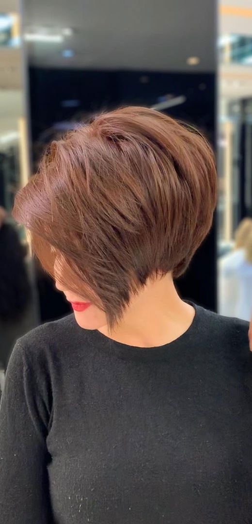 50 Short Hairstyles That Looks so Sassy : Light Mahogany Pixie with Layers