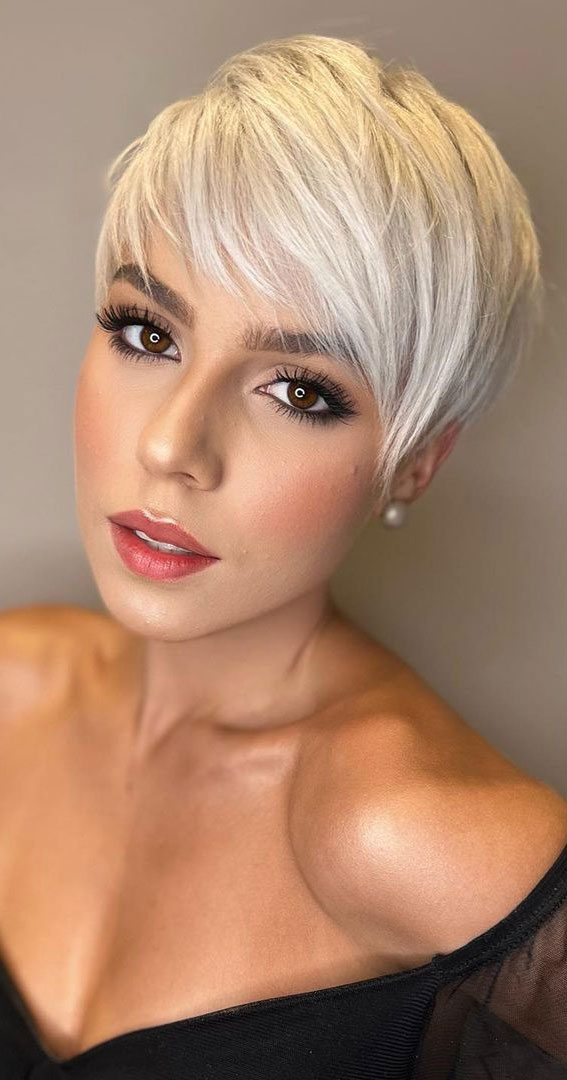 50 Short Hairstyles That Looks so Sassy : Platinum Blonde Pixie with Bangs