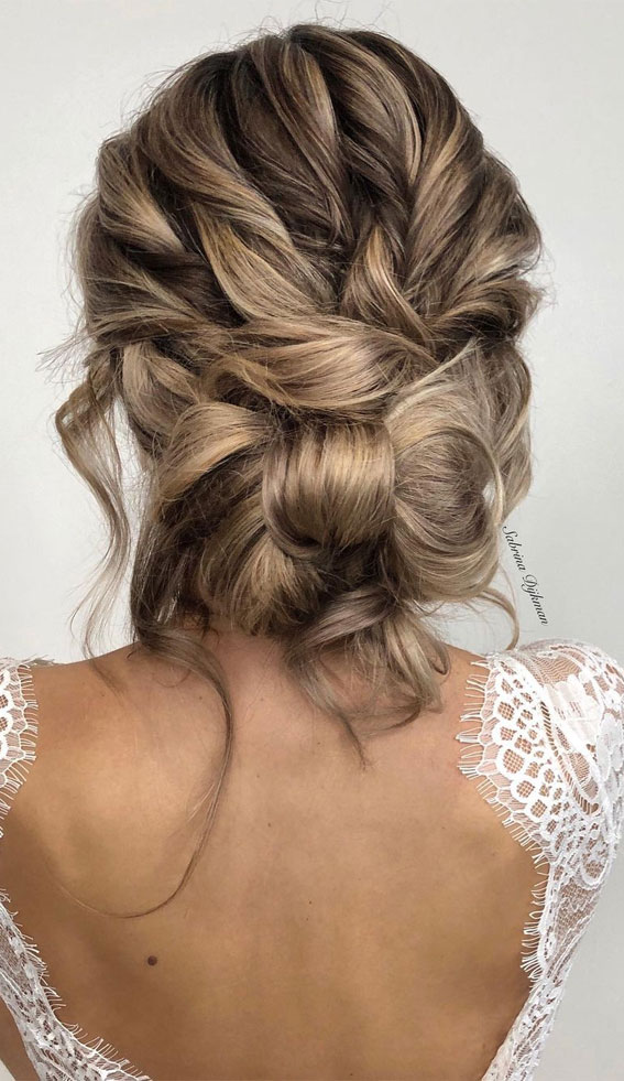 50 Best Updo Hairstyles For Trendy Looks in 2022 : Bow Knot Textured Low Bun