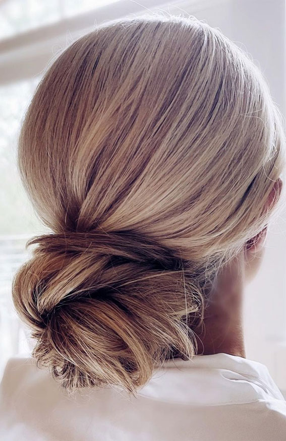 low structured bun , updo, updo hairstyles 2022, trendy updos