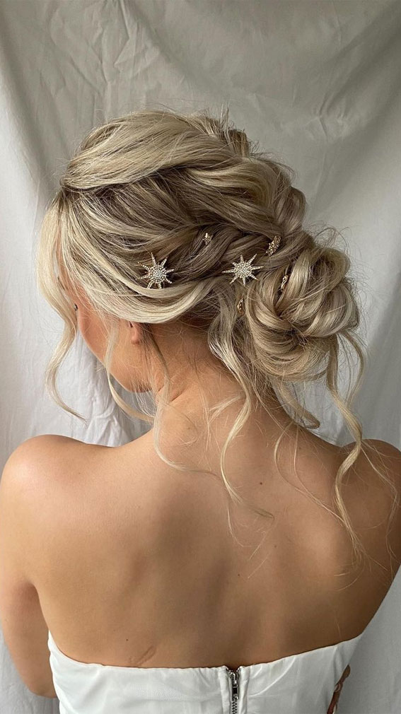 50 Best Updo Hairstyles For Trendy Looks in 2022 : Braided Messy Low Bun with Starbursts