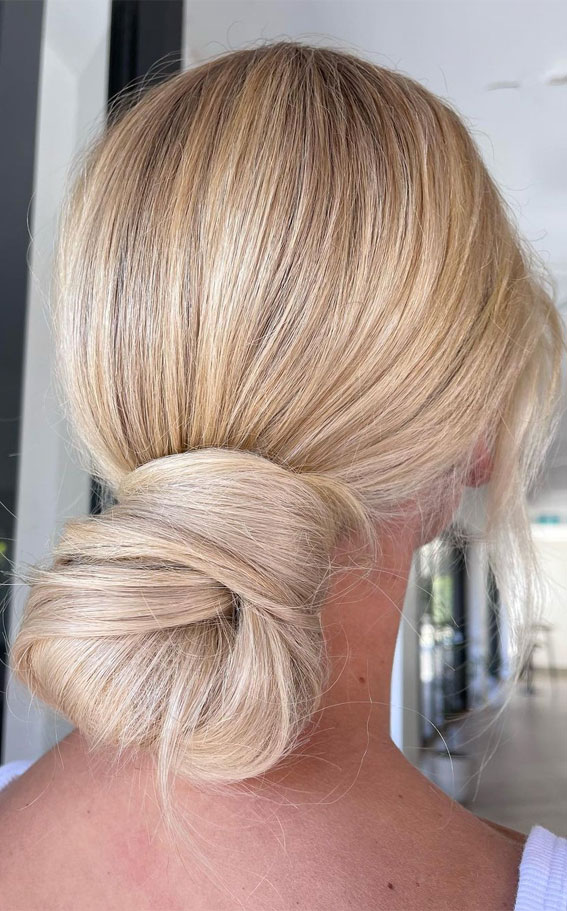 50 Best Updo Hairstyles For Trendy Looks in 2022 : Timeless Wrapped Low Bun