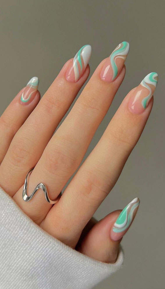 mint wavy nails, mint and white clear base nails, nude base nails, negative space nails, spring nails, mint nail art design