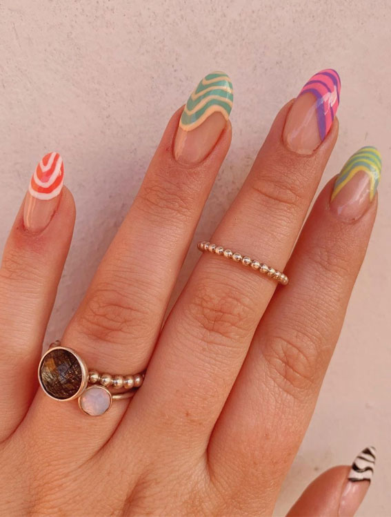 multi-colored french tips, colorful french tip nails, coloured french tips short nails, coloured french tip nails, modern french manicure, french manicure 2022, colored tips acrylic nails, french manicure ideas, colored tips nails, blue french tip nails, colored french tips almond, gel nails