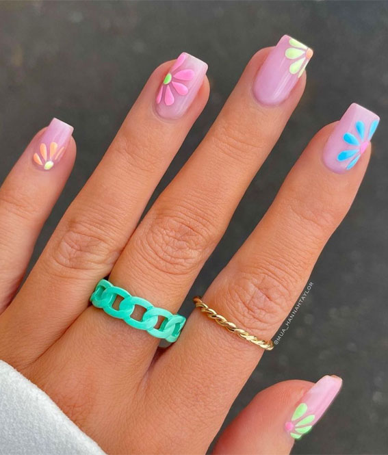 colorful flower nails, spring nail designs 2022, mix and match nail designs,  swirl nails, spring nail ideas, spring nail colors, 2022 spring nail colors, rainbow spring nails, bright color spring nails, spring nail art, spring nail art 2022, nail art designs 2022