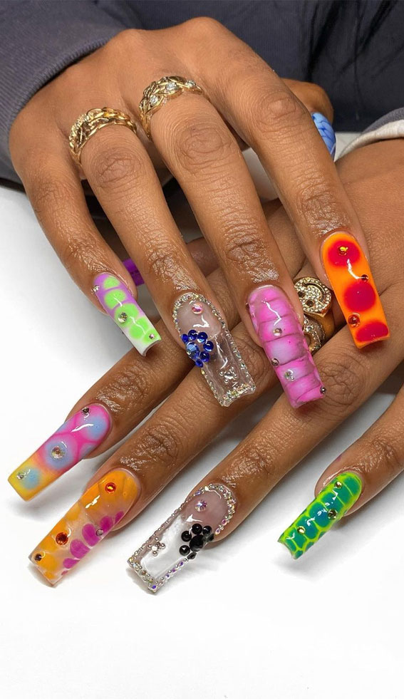 mixed flower and snakeskin print nails, nail designs 2022, latest nail art designs gallery, acrylic nail designs, summer nail art, awesome nails, coolest nail ideas, cute nail designs, pictures nails designs, acrylic nails