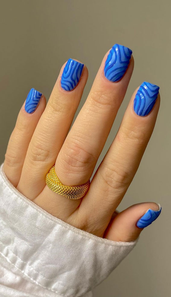 32 Prettiest Autumn 2022 Nail Trends to Try Now : Blue Swirl on Blue Nails
