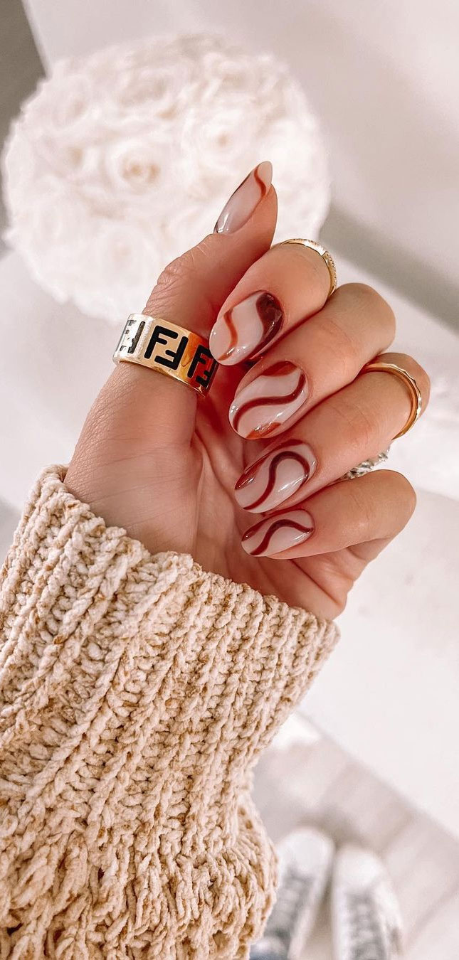 Beautiful female hands with a bright red matte manicure on a background of  denim. Stylish oval nail design. Summer manicure. Copy space. 26813720  Stock Photo at Vecteezy