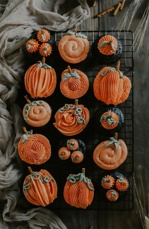 40+ Halloween Cupcake Ideas : Buttercream Pumpkin-Coloured Cupcakes
