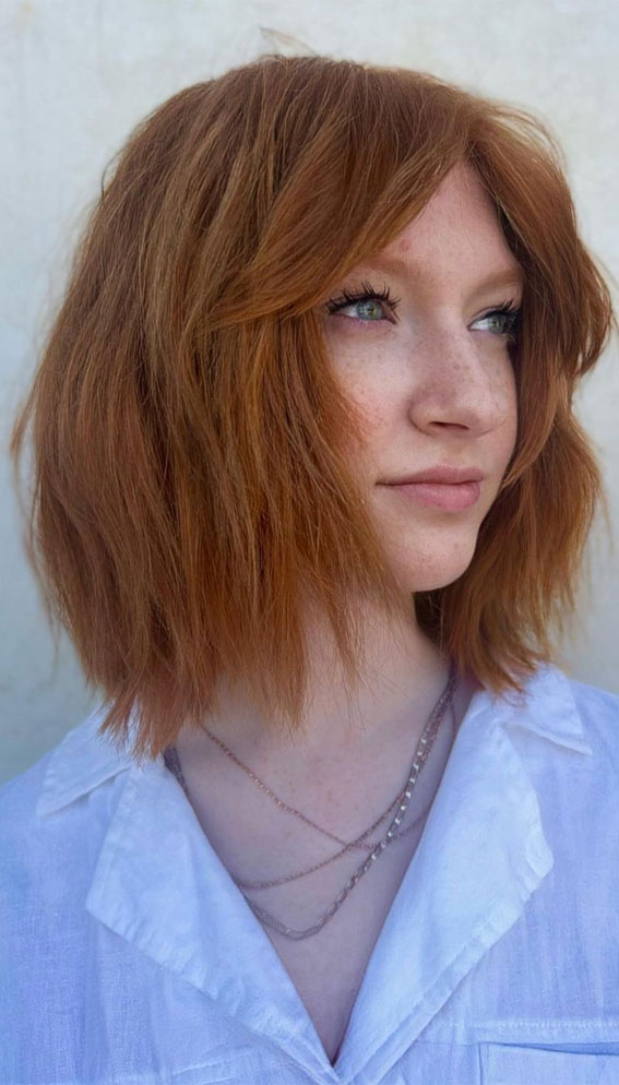 50 Best Short Hair with Bangs : Copper Shaggy Bob with Curtain Bangs