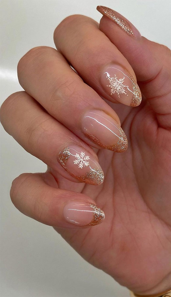 45 Beautiful Festive Nails To Merry The Season : Glittery Sheer Nails with Snowflakes 