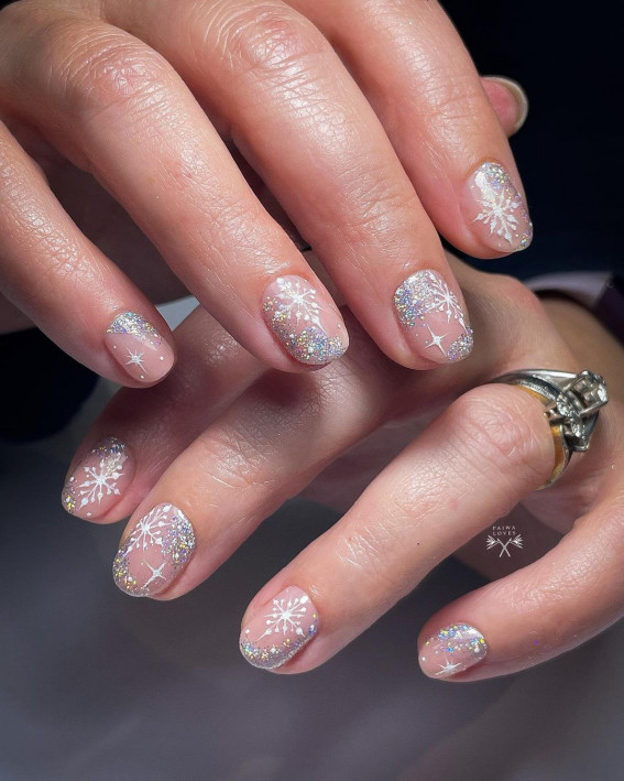 50+ Christmas & Holiday Nails For A Festive Look : Glitter Negative Space Nails with Snowflake