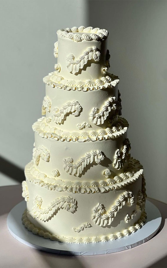 Top 50 Wedding Cake Trends 2023 : Four-Tiered Buttercream Cake