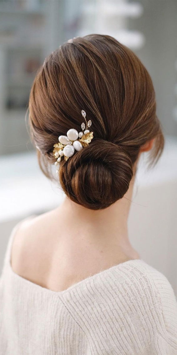 53 Best Wedding Hairstyles for 2023 Brides : Simple Twisted Low Bun