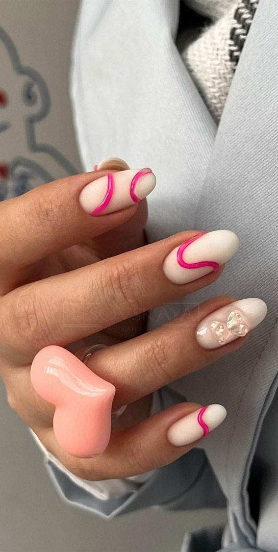 40 Awesome Spring Nail Ideas 2023 : Pink Swirl Embellishment