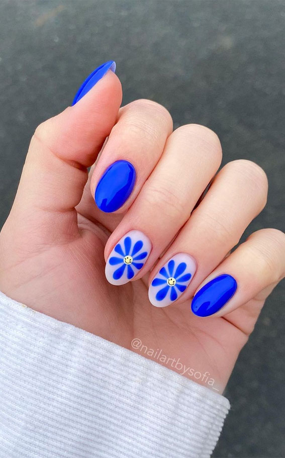 Your Nails Deserve These Floral Designs : Happy Blue Flower Milky Nails