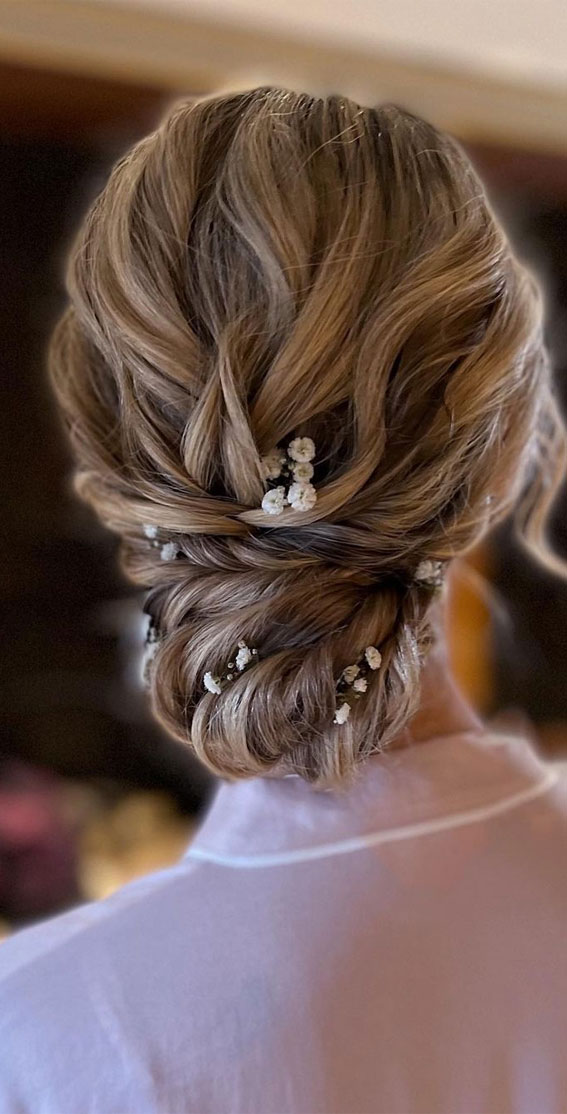 50+ Updo Hairstyles That’re So Stylish : Low Bun with Baby’s Breath
